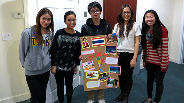 Students showing off their group projects.